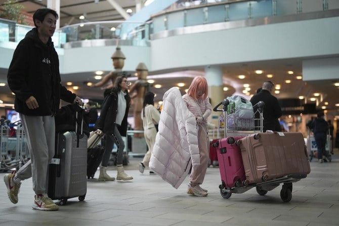 カナダは1月5日（木）より、中国、香港、マカオからカナダに入国する旅行者は、出発前に新型コロナウィルスの検査で陰性であることを義務付けた。 (AP)